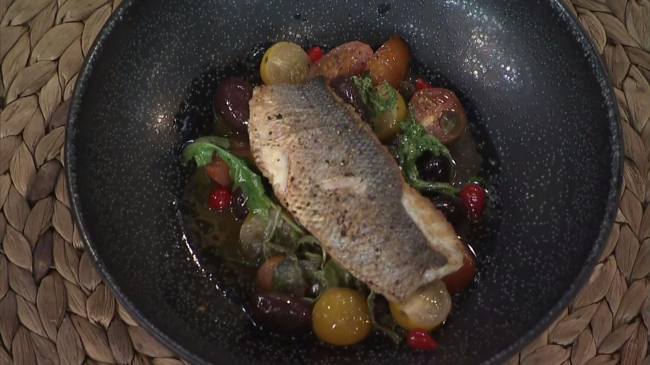 Pan-seared sea bass with tomatoes and capers