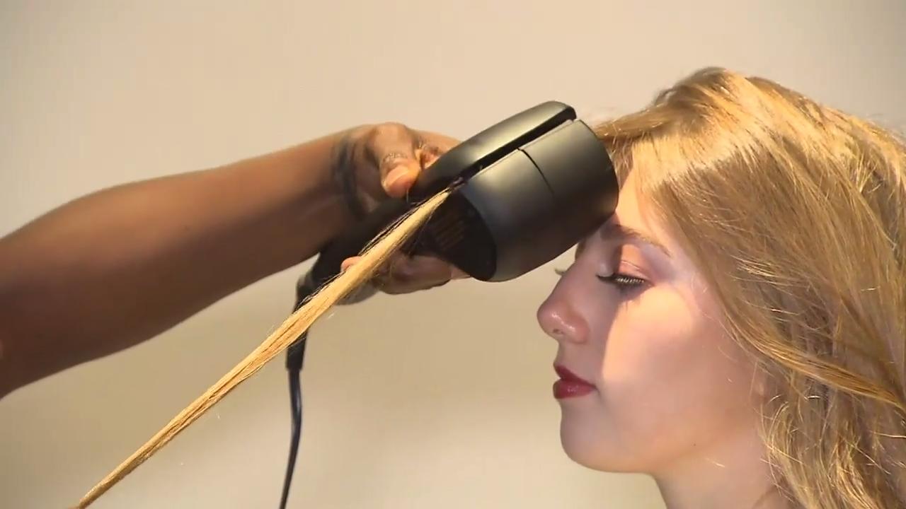 The allinone hair tool to curl and straighten Video Cityline