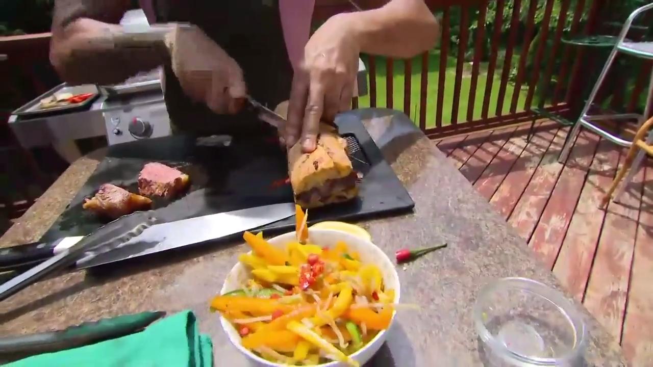 Steak sandwich with horseradish mayo and mango salad